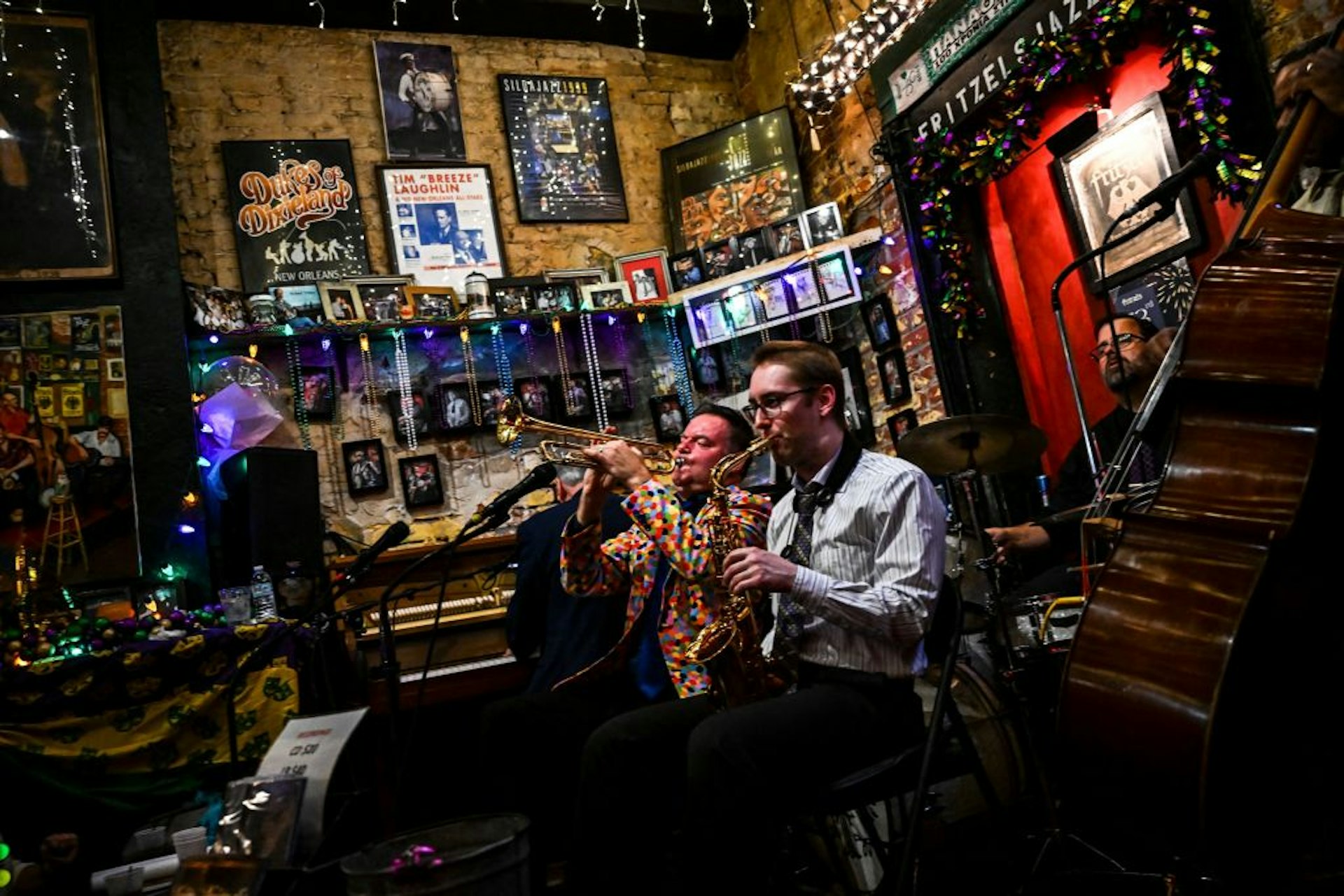 A group of musicians play at the Fritzel Jazz Club in the French Quarter during a Mardi Gras celebration in New Orleans, Louisiana, on February 19, 2023