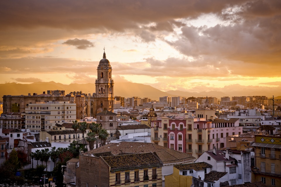 City of Malaga, capital of the Costa del Sol, at sunset.
