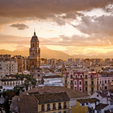 City of Malaga, capital of the Costa del Sol, at sunset.