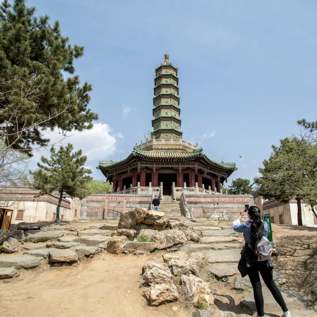 CHENGDE, HEBEI PROVINCE, CHINA - 2015/04/23: Seven-story octagonal Liuli-Wanshou pagoda (Glazed Tile Pagoda of Longevity).  The Xumi Fushou Temple (Temple of  Sumeru Happiness and Longevity) is one of the Eight Outer Temples in Chengde,  which are listed as the World cultural sites along with Chengde Mountain Resort.  The temple was first designed in 1780 to celebrate the 70th Birthday of Emperor Qianlong and built for Penchen Lama the VI. (Photo by Zhang Peng/LightRocket via Getty Images)
471431506
Xumi Fushou Temple, Temple of  Sumeru Happiness and Longevity, Eight Outer Temples, Chengde, World Heritage site, Mountain Resort, temple, Chinese, China, Tibetan, architecture, religion, belief, Buddhist, Buddhism, historic, imperial, relic, travel destination, tourist attraction, tourism, pagoda, glazed