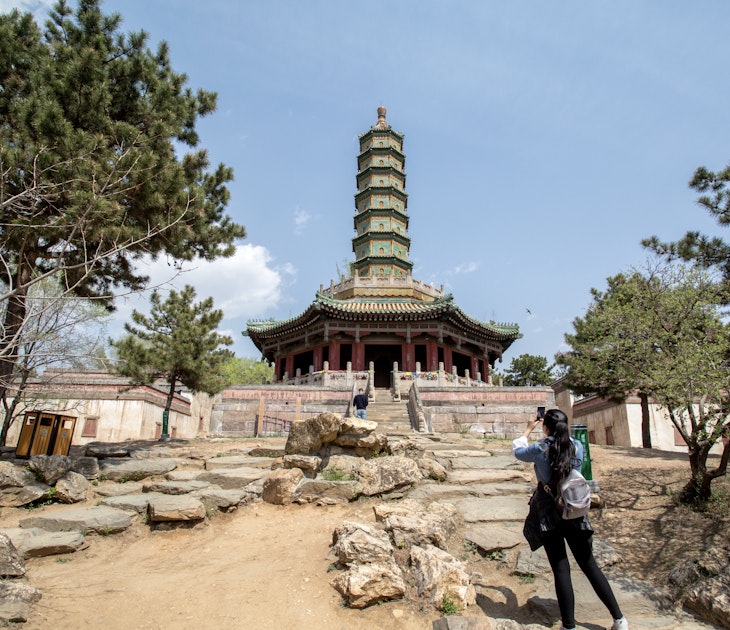 CHENGDE, HEBEI PROVINCE, CHINA - 2015/04/23: Seven-story octagonal Liuli-Wanshou pagoda (Glazed Tile Pagoda of Longevity). The Xumi Fushou Temple (Temple of Sumeru Happiness and Longevity) is one of the Eight Outer Temples in Chengde, which are listed as the World cultural sites along with Chengde Mountain Resort. The temple was first designed in 1780 to celebrate the 70th Birthday of Emperor Qianlong and built for Penchen Lama the VI. (Photo by Zhang Peng/LightRocket via Getty Images)
471431506
Xumi Fushou Temple, Temple of Sumeru Happiness and Longevity, Eight Outer Temples, Chengde, World Heritage site, Mountain Resort, temple, Chinese, China, Tibetan, architecture, religion, belief, Buddhist, Buddhism, historic, imperial, relic, travel destination, tourist attraction, tourism, pagoda, glazed