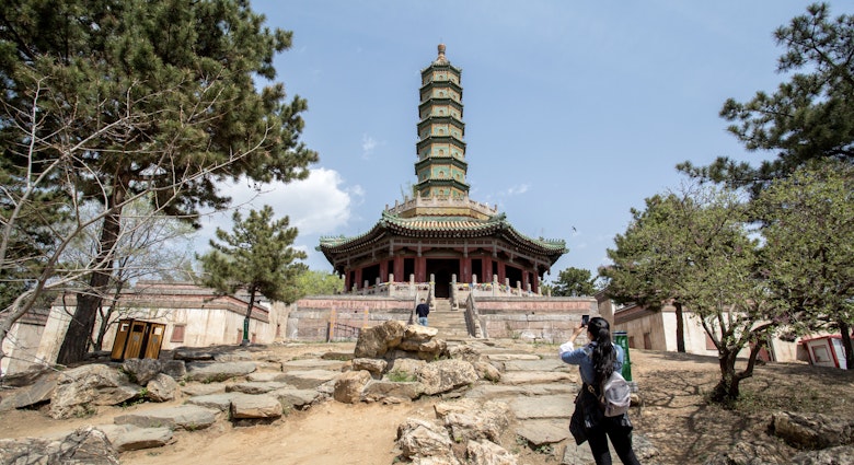CHENGDE, HEBEI PROVINCE, CHINA - 2015/04/23: Seven-story octagonal Liuli-Wanshou pagoda (Glazed Tile Pagoda of Longevity). The Xumi Fushou Temple (Temple of Sumeru Happiness and Longevity) is one of the Eight Outer Temples in Chengde, which are listed as the World cultural sites along with Chengde Mountain Resort. The temple was first designed in 1780 to celebrate the 70th Birthday of Emperor Qianlong and built for Penchen Lama the VI. (Photo by Zhang Peng/LightRocket via Getty Images)
471431506
Xumi Fushou Temple, Temple of Sumeru Happiness and Longevity, Eight Outer Temples, Chengde, World Heritage site, Mountain Resort, temple, Chinese, China, Tibetan, architecture, religion, belief, Buddhist, Buddhism, historic, imperial, relic, travel destination, tourist attraction, tourism, pagoda, glazed