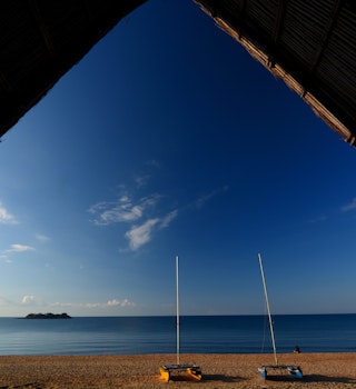 680860287
Beach, Beauty In Nature, Day, Horizon Over Water, Nature, Nautical Vessel, No People, Outdoors, Scenics, Sea, Shore, Sky, Tranquil Scene, Tranquility, Water, Malawi, Mzuzu
View of a beach in Malawi from inside a tent