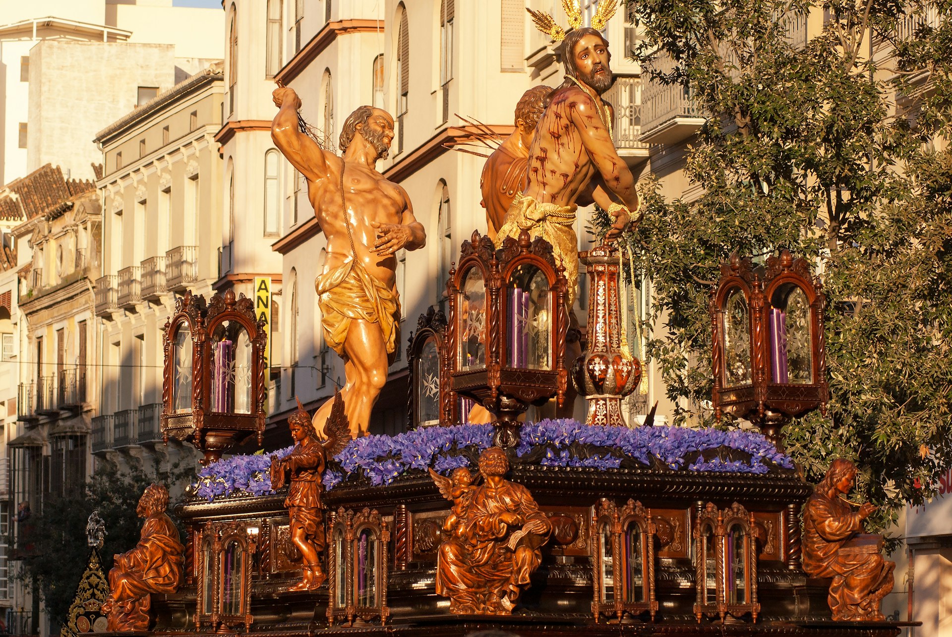 Statues of Jesus being whipped at Semana Santa in Malaga