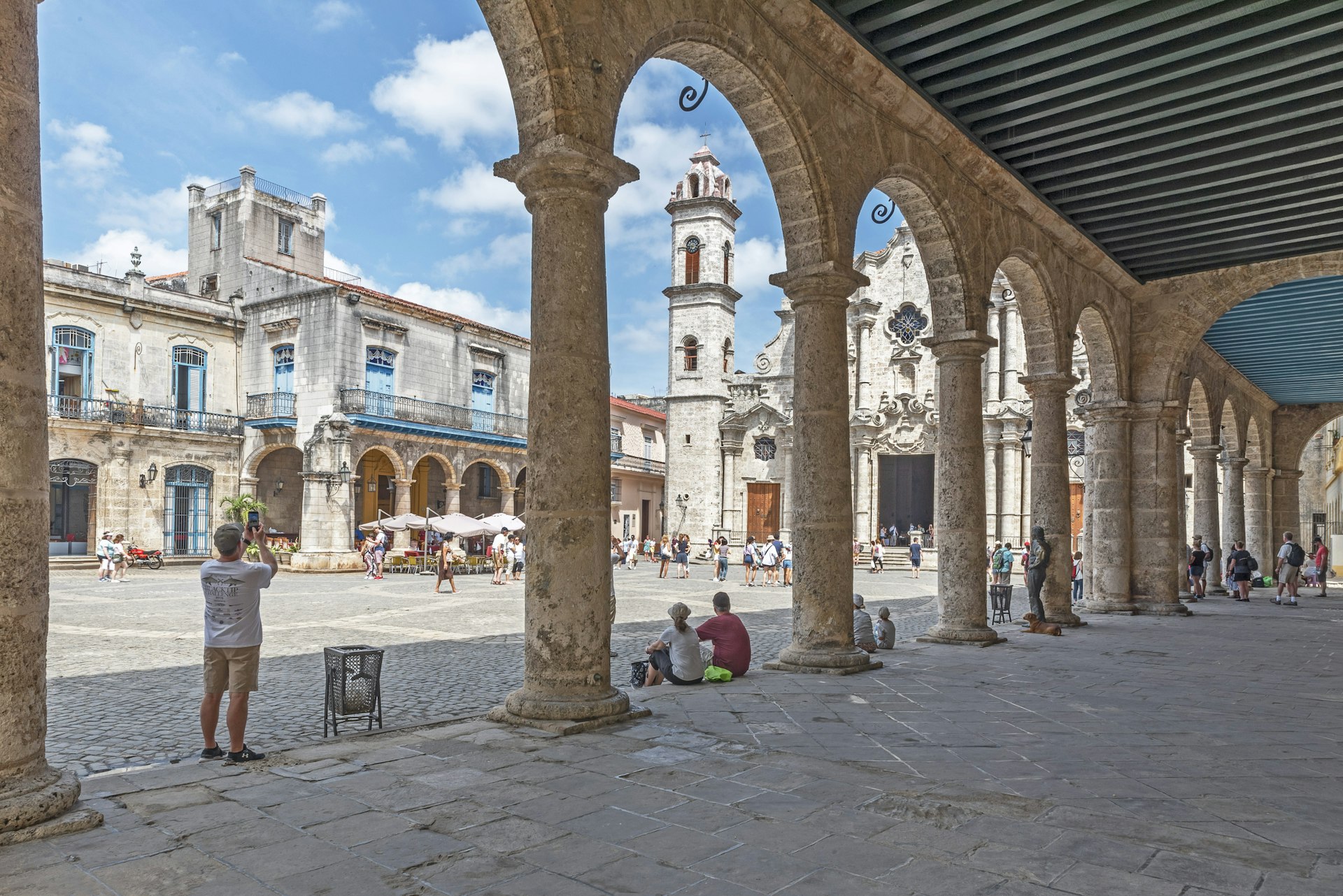 Visitors at Havana Cathedral with the Cathedral Plaza.
