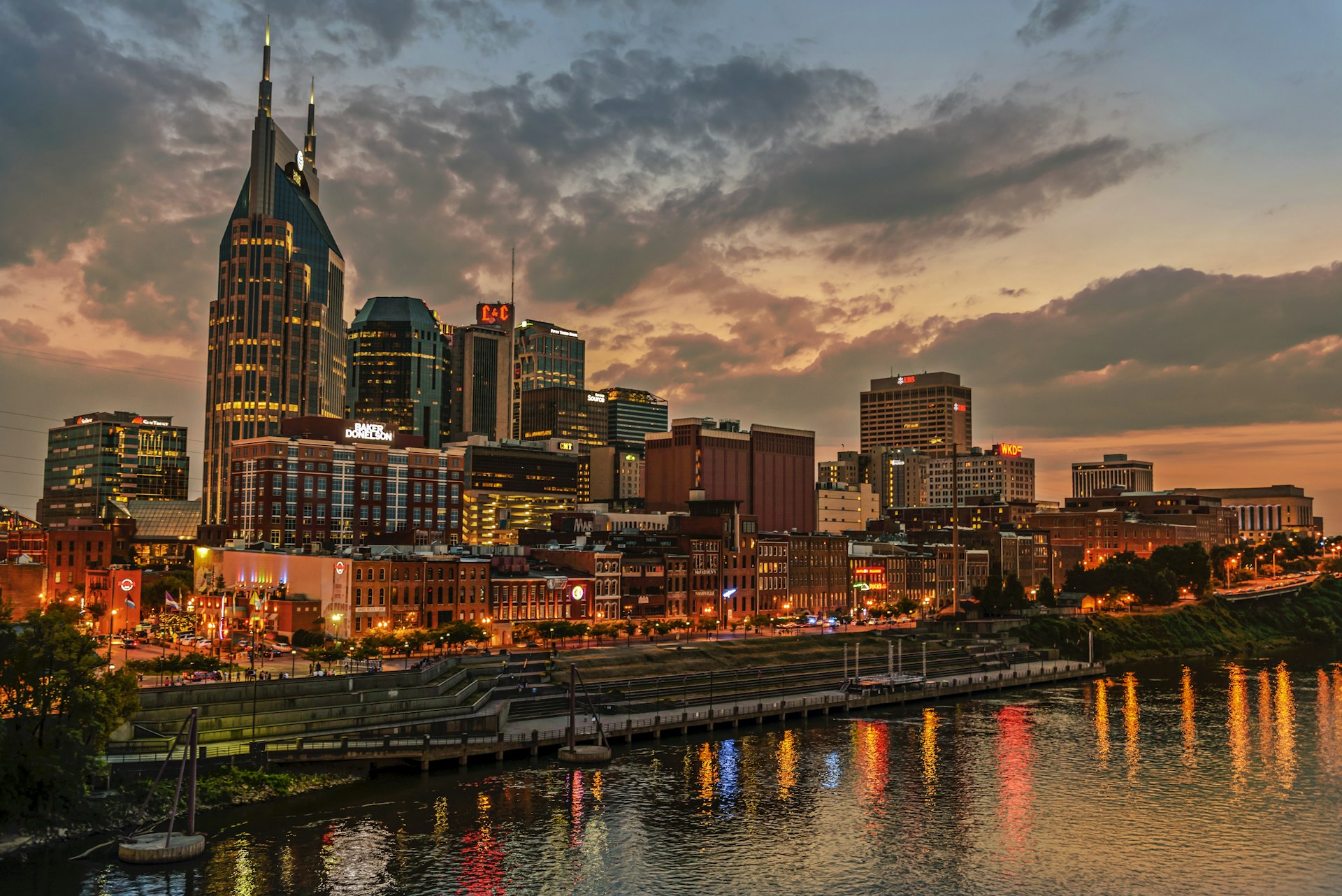 The skyline of Nashville Tennessee, USA at sunset. 531963907 Nashville, Outdoors, USA, Downtown District, Southern USA, Cumberland River, Nashville Rising, Horizontal, Tennessee, Photography, City, Urban Skyline