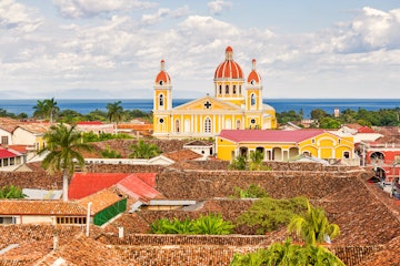 The city of Granada and the landmark Cathedral of Granada in Nicaragua with Lake Nicaragua in the background.

