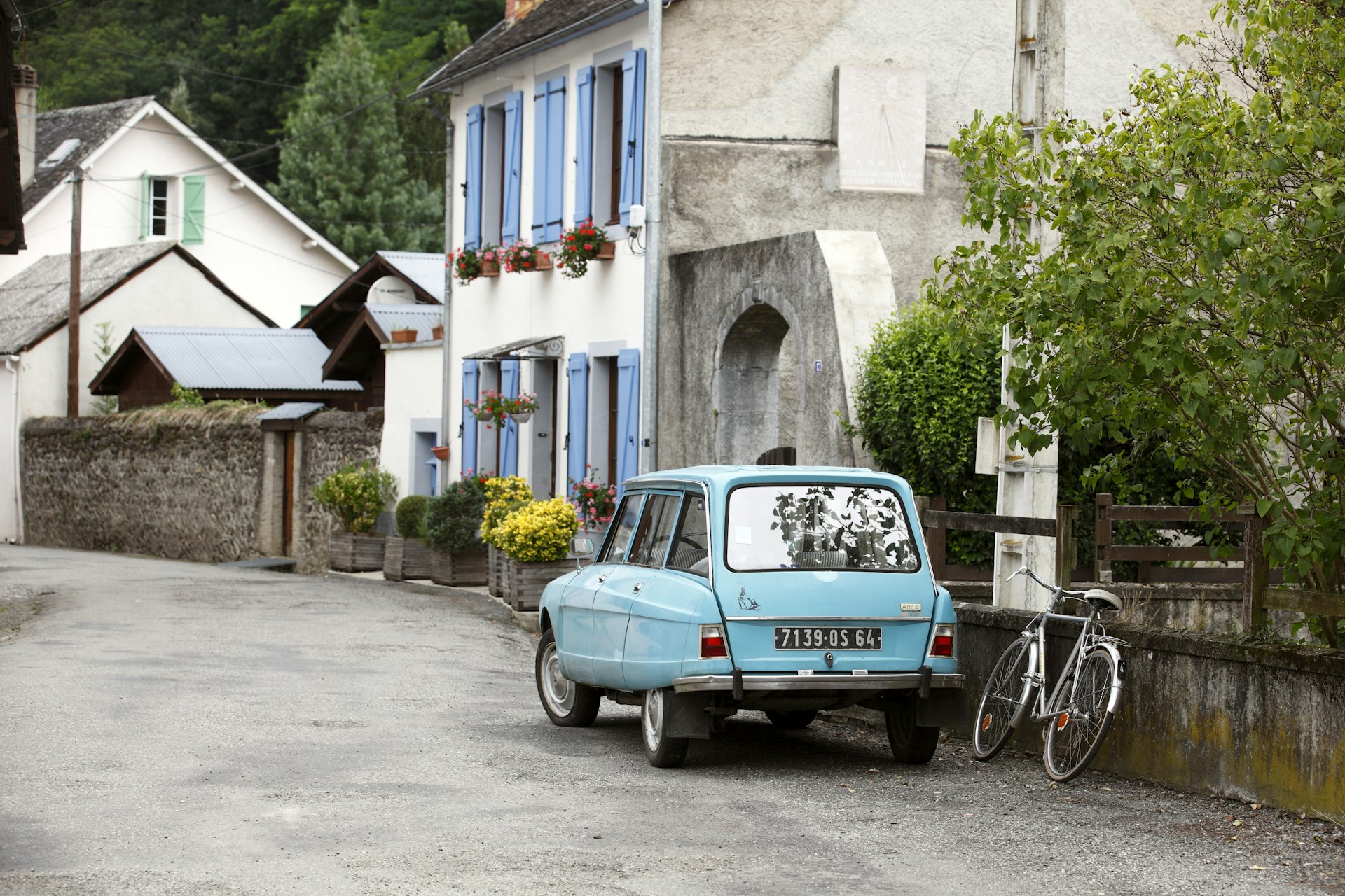 Citroen Ami 8 parked on street in Arette in Pyrenees