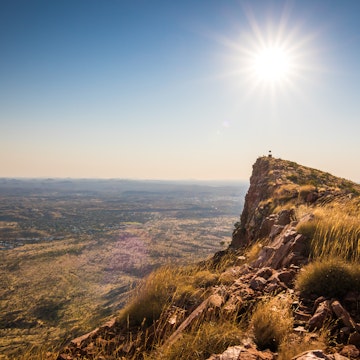 Hiker at the top of Mount Gillen just outside Alice Springs in central Australia. ; Shutterstock ID 1155510496; your: Sloane Tucker; gl: 65050; netsuite: Online Editorial; full: destination
1155510496