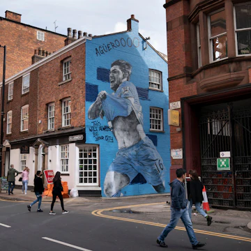 2FWG7WN Manchester, UK, 22rd May 2021. A new mural of Manchester City footballer Sergio Aguero is seen in Manchesters Northern Quarter the day before the team are presented with the English Premier League trophy, Manchester, UK. Aguero has agreed to sign for Barcelona on a two-year contract when his Manchester City deal expires next month. Credit: Jon Super/Alamy Live News.