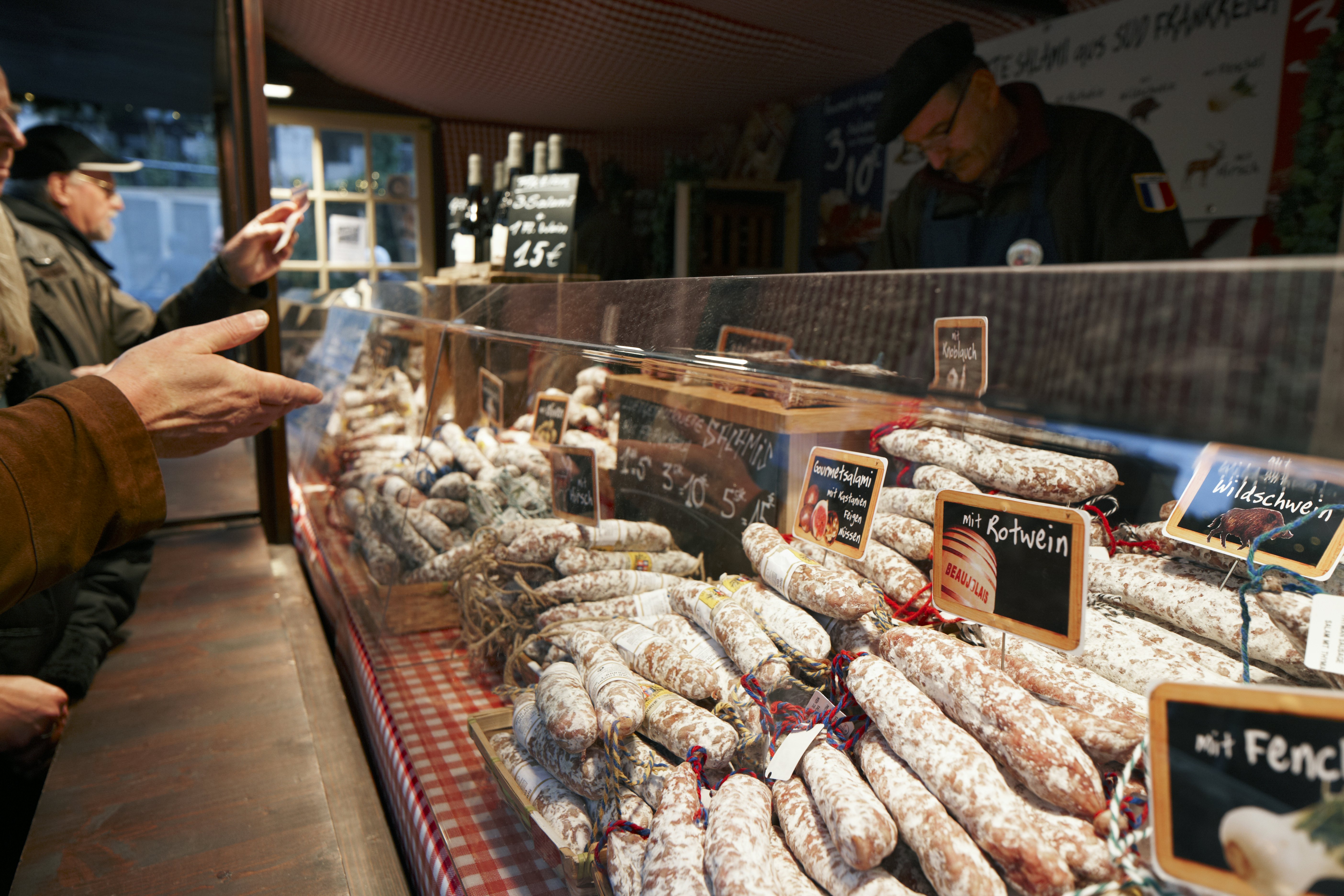 Cologne Christmas Market stall serving traditional sausage