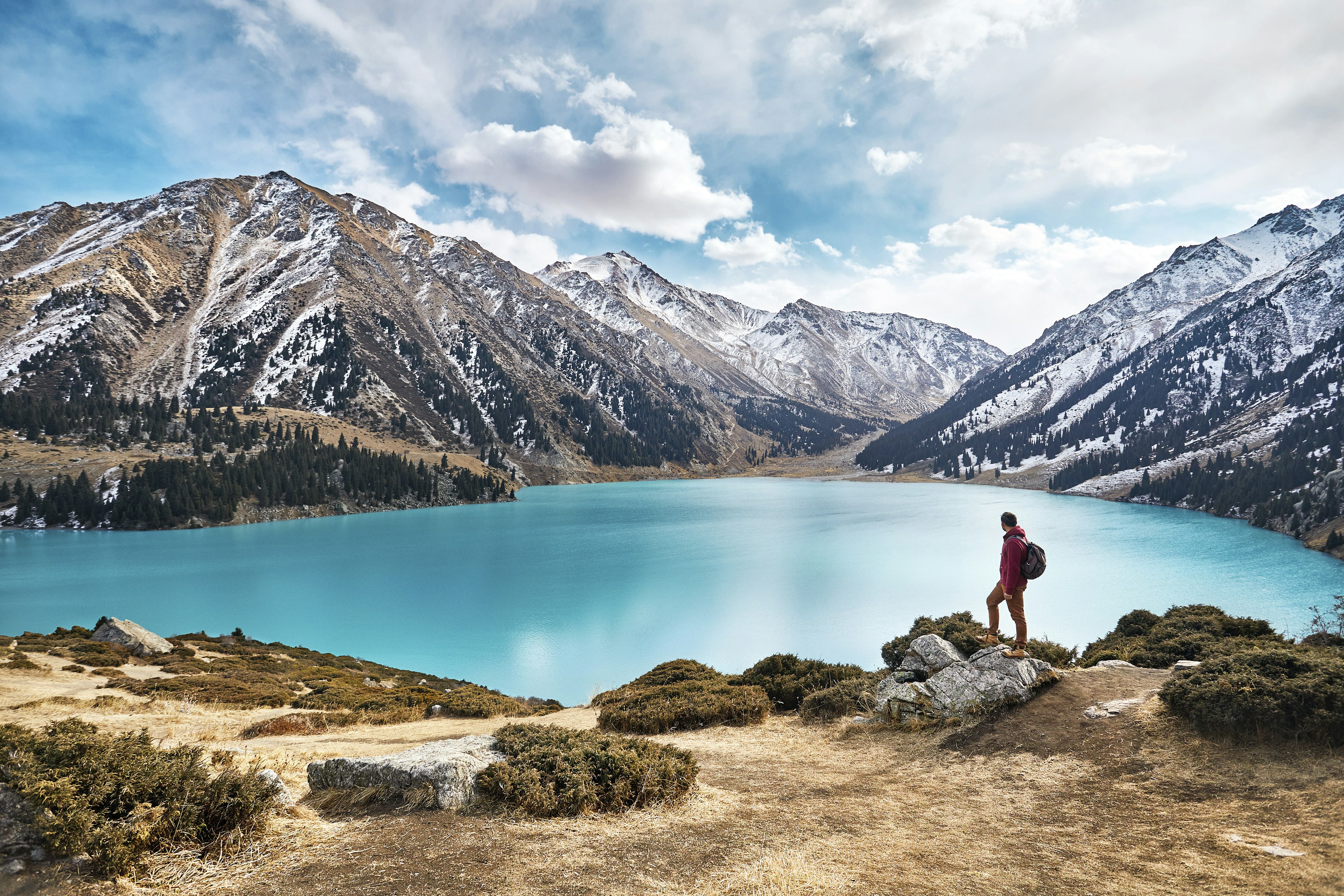 Scenic view of a man looking over Almaty.