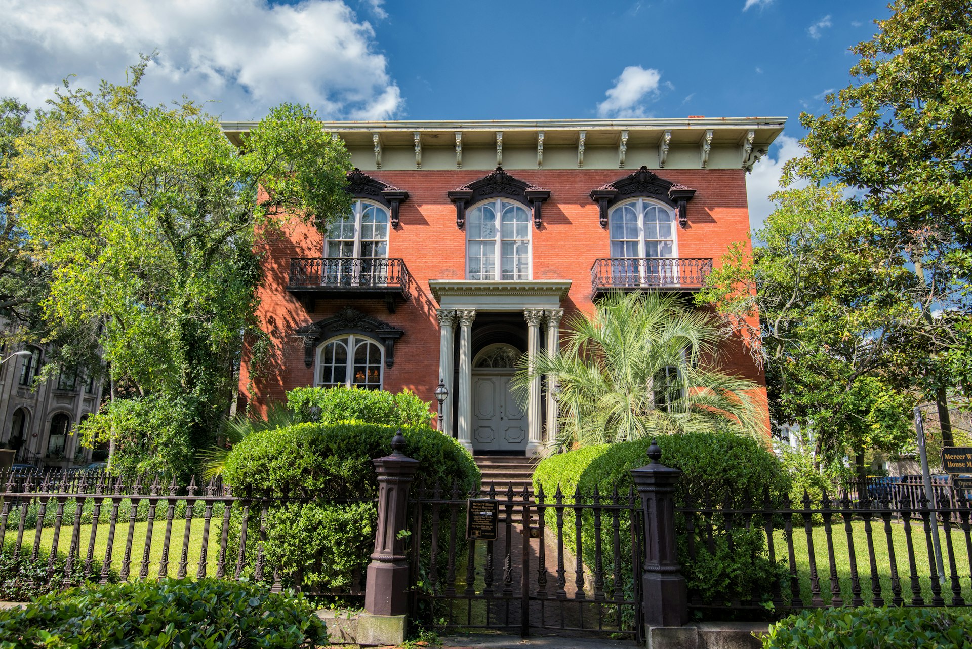 A red brick house with columns in Savannah, Georgia