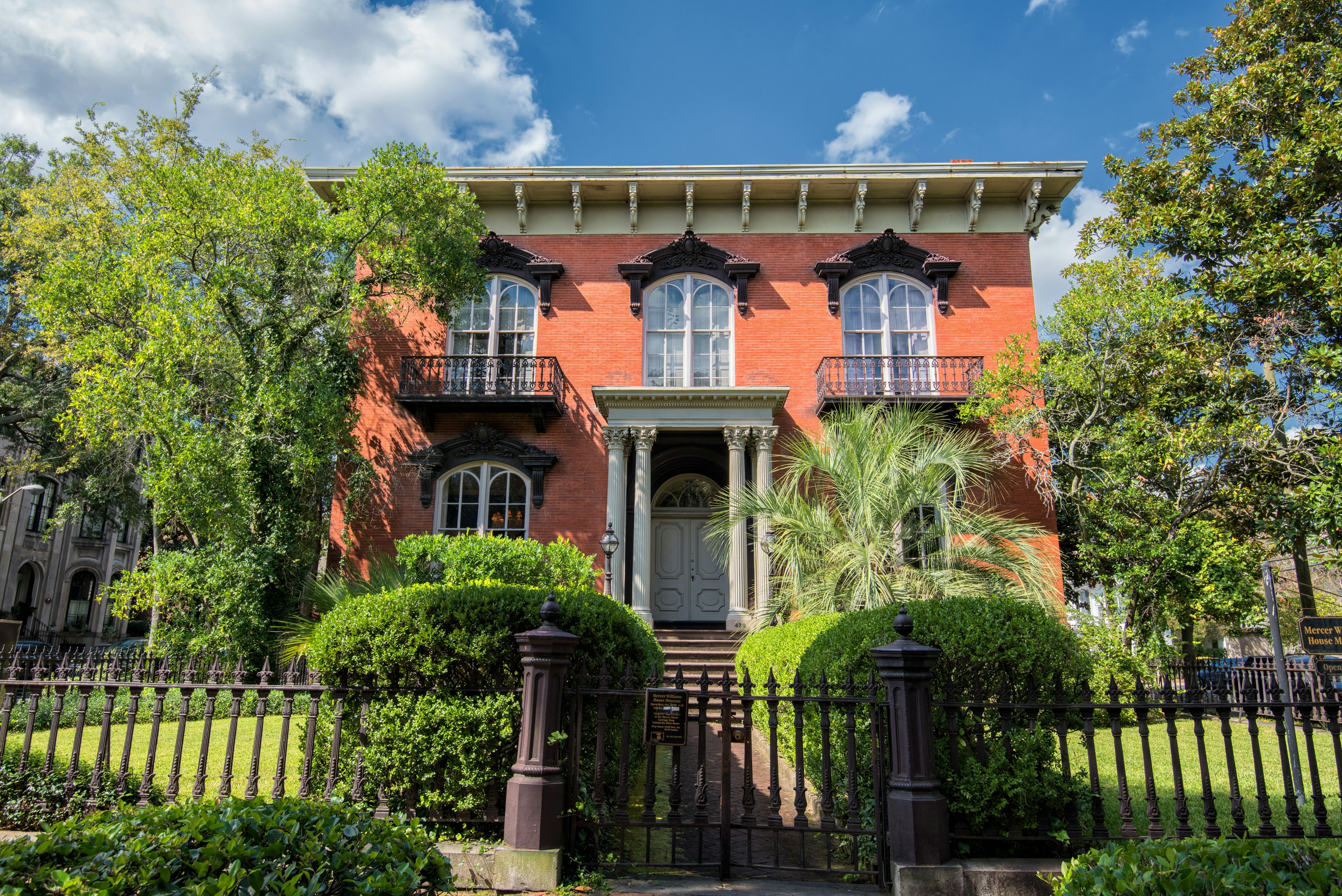 A red brick house with columns in Savannah, Georgia