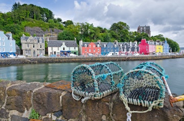 Fishing traps on a wall in summertime in the town of Tobermory on the isle of Mull in the inner Hebrides.
