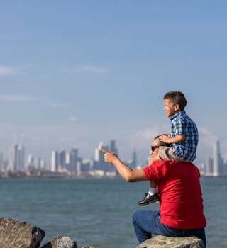 Father and son looking at the city of panama; Shutterstock ID 1073963873; your: ClaireN; gl: 65050; netsuite: Online ed; full: Panama City things to know
1073963873