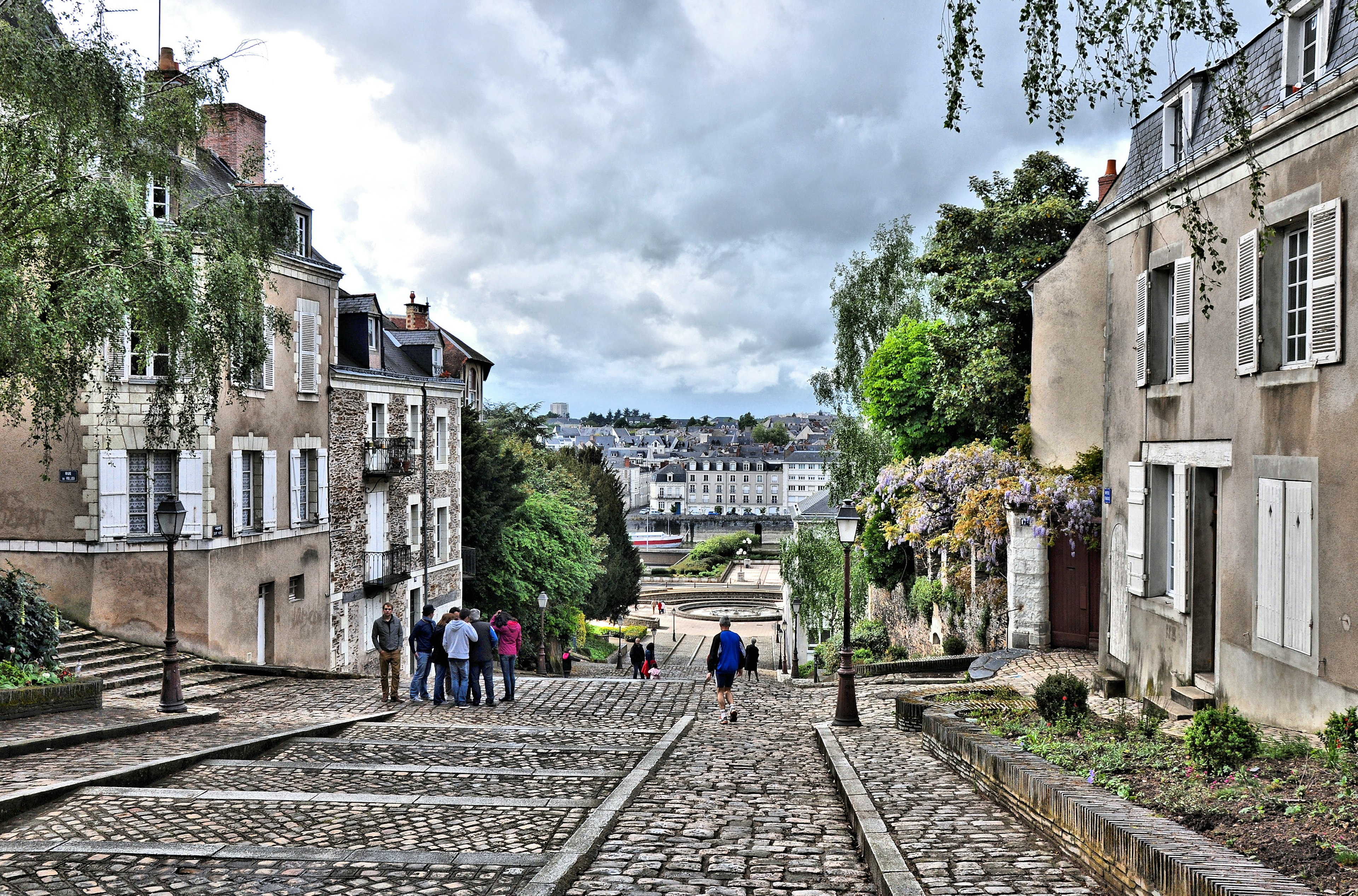 Streets running down to the Loire River in the historic center in city of Angers, France