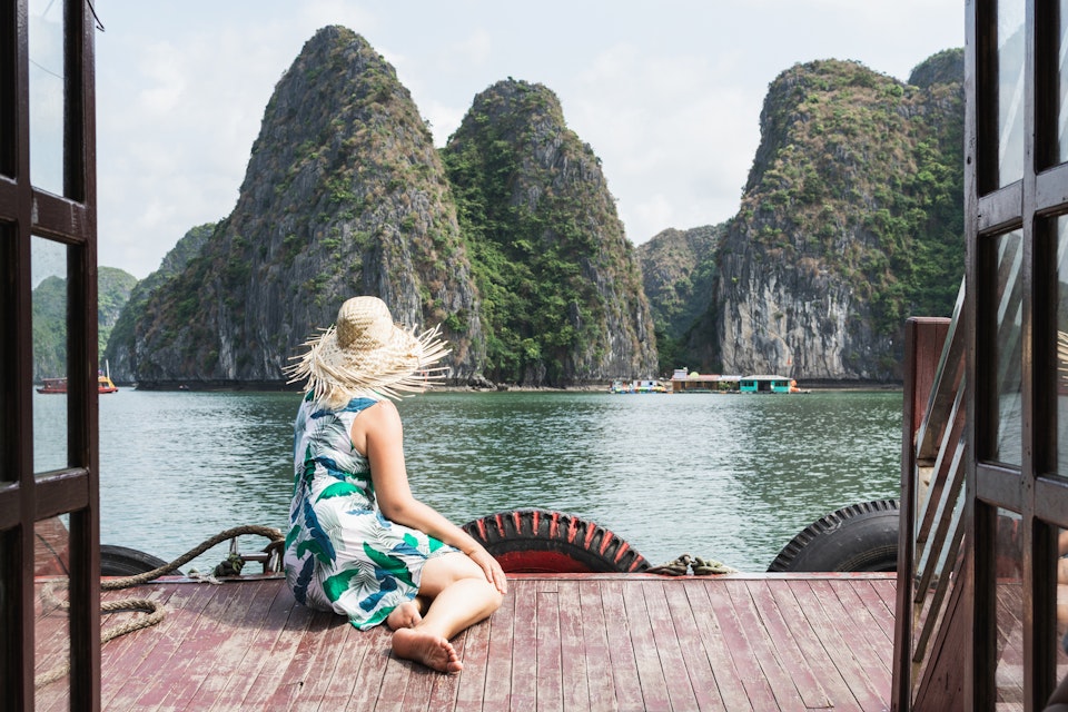 Young Caucasian blonde woman in a straw hat enjoying the boat ride at Lan Ha Bay, Cat Ba island, Vietnam; Shutterstock ID 1466647397; your: ClaireN; gl: 65050; netsuite: Online ed; full: Vietnam with Elsewhere
1466647397