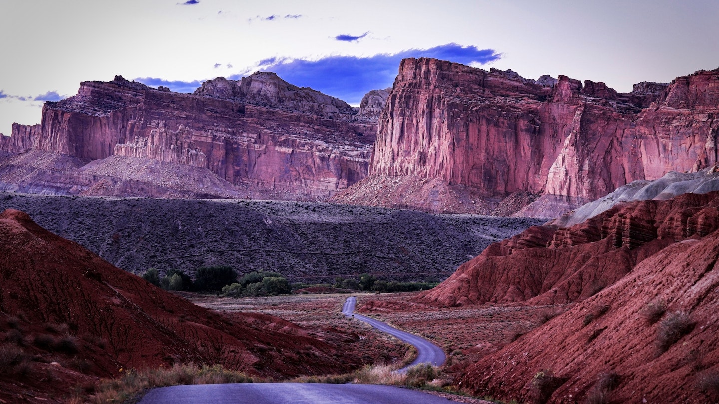 West face of the Waterpocket Fold along the Capitol Reef Scenic Drive in Capitol Reef National Park photographed from the park scenic drive at dusk.; Shutterstock ID 2267004541; your: Ben N Buckner; gl: 65050; netsuite: Online Editorial; full: AZ Parks
2267004541