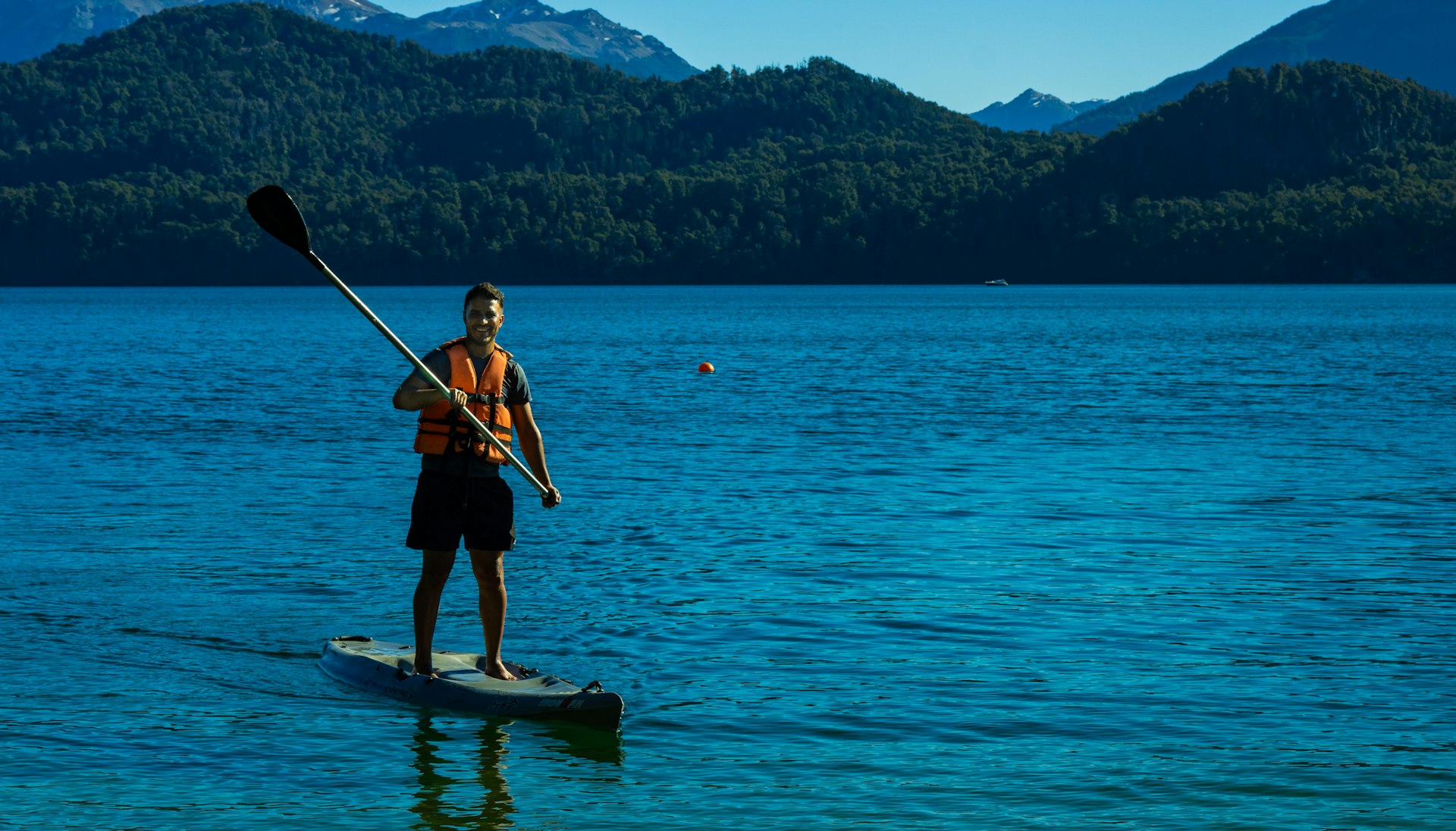 Elsewhere guide Lucas Kambic stand-up paddleboarding