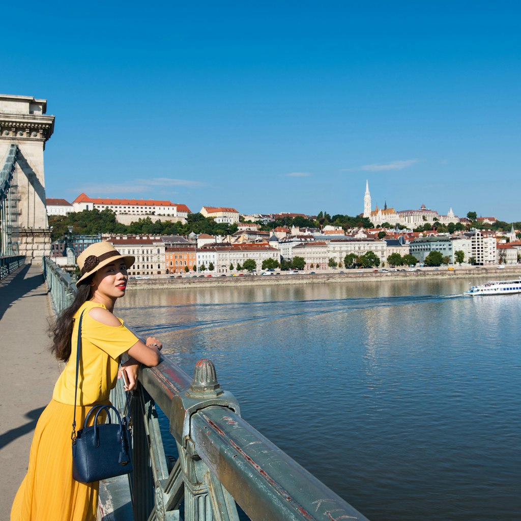 Female tourist enjoying Budapest view from the chain bridge
1036775166