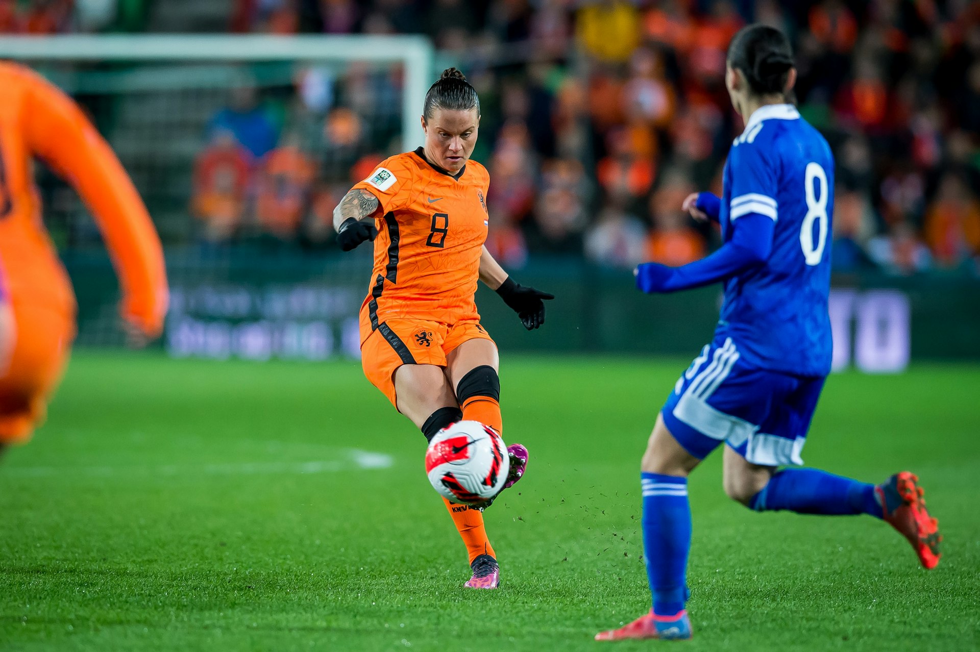 Sherida Spitse of the Netherlands, Andria Michael of Cyprus during the Women's World Cup Qualifying match between the Netherlands and Cyprus at the Euroborg Stadium on April 8, 2022 in Groningen, Netherlands