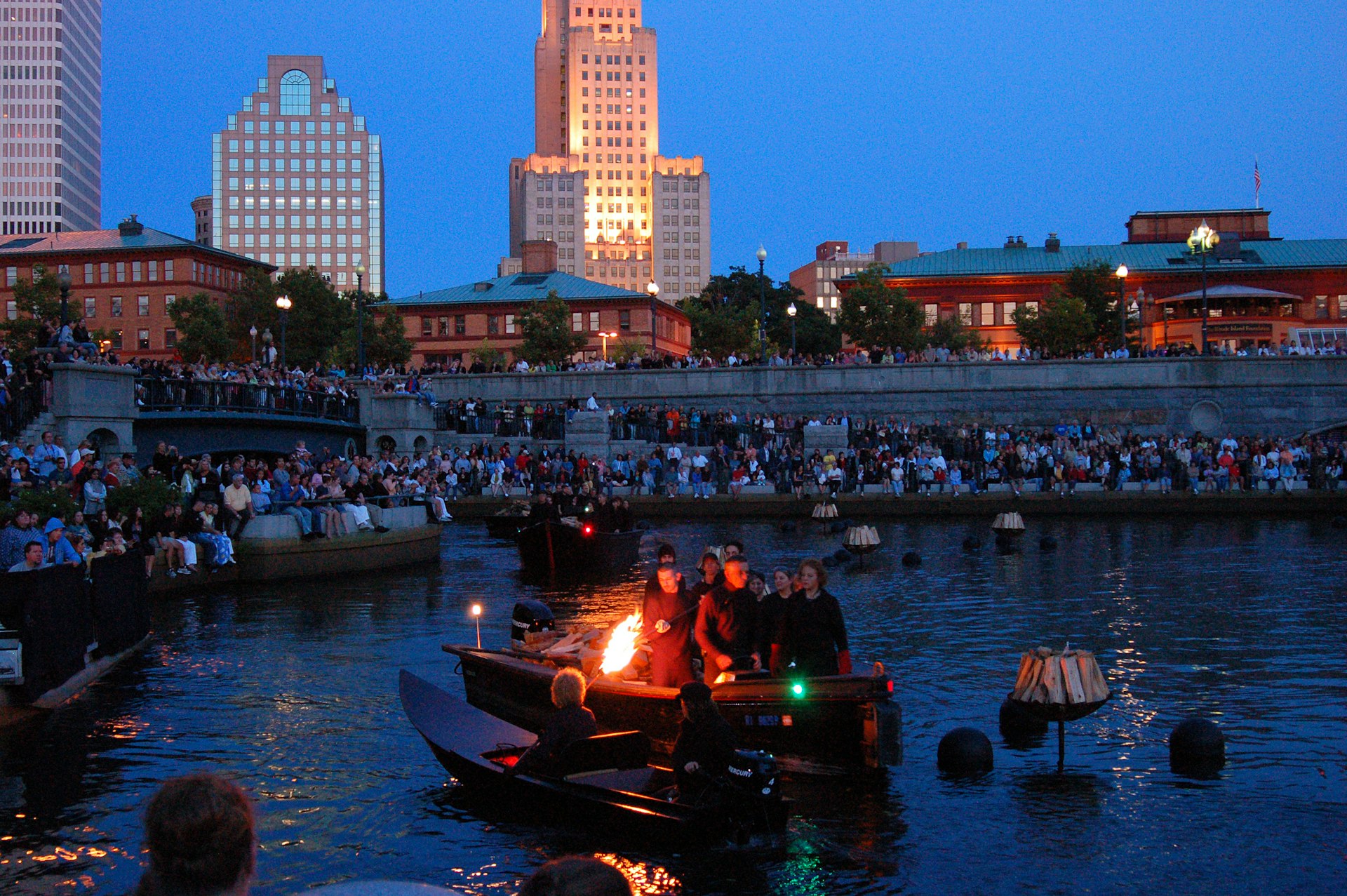 Bonfires are lit in the rivers of Providence Rhode Island, part of the Waterfire festivals.