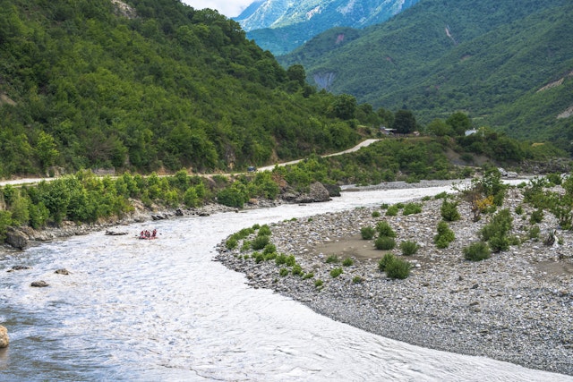 A team of boys does rafting along the Vjosa River, near Përmet, Albania