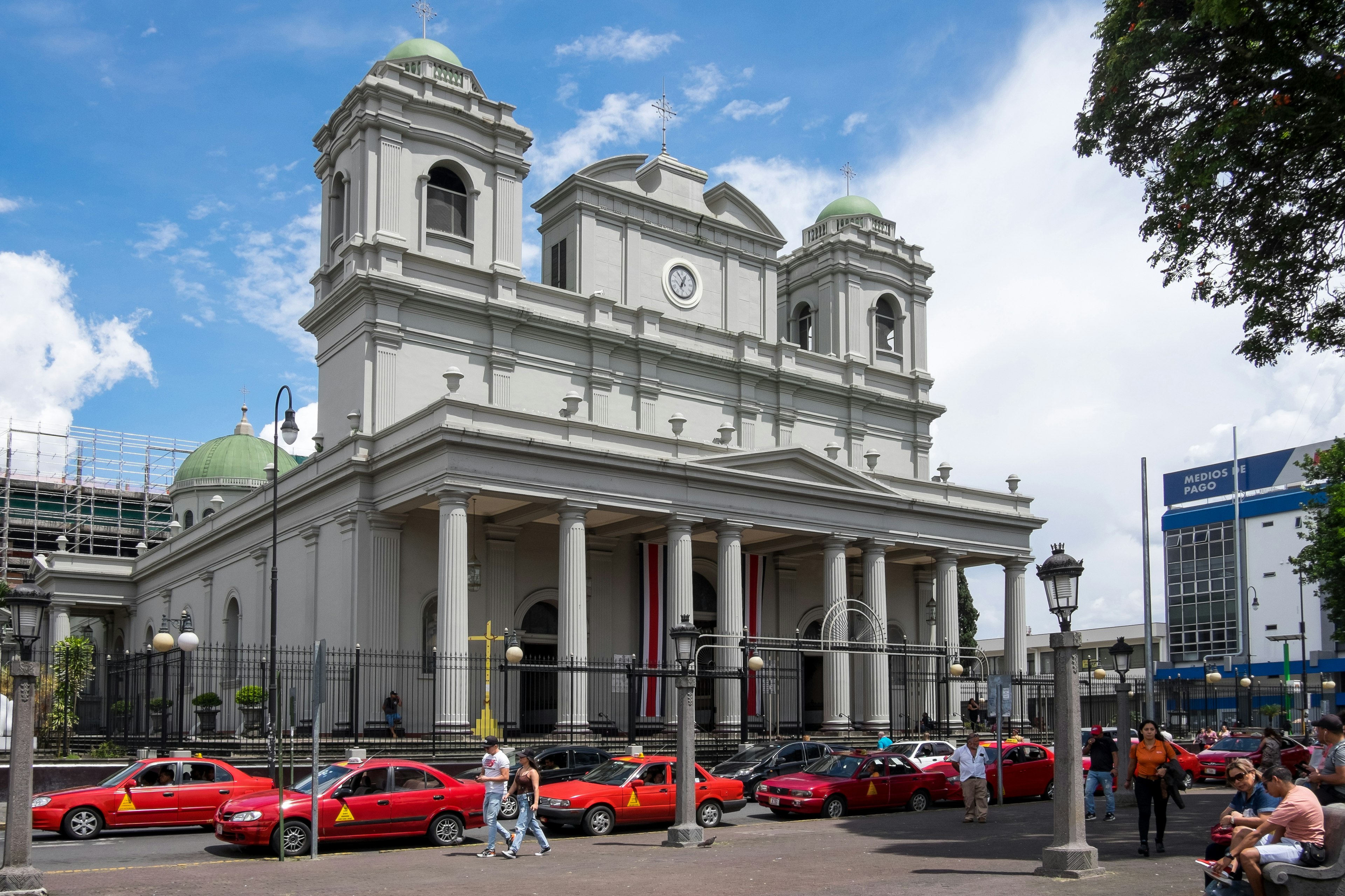 Taxi rank and cathedral building in the urban center of San Jose, Costa Rica