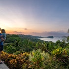 Father and toddler daughter enjoying a vibrant sunrise over the wild untamed coastal beauty of Manuel Antonio National Park on the Pacific Coast of Costa Rica.
1474914256