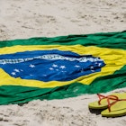 brazilian flag and havaianas at Copacabana's beach , Rio de Janeiro, Brazil on Tuesday February 18th, 2014 (Photo by Paulo Fridman/Corbis via Getty Images)
542647306
sand:CB2, flag:CB2, beach:CB2, Copacabana:CB2, sun:CB2, rj:CB2, sun.:CB2