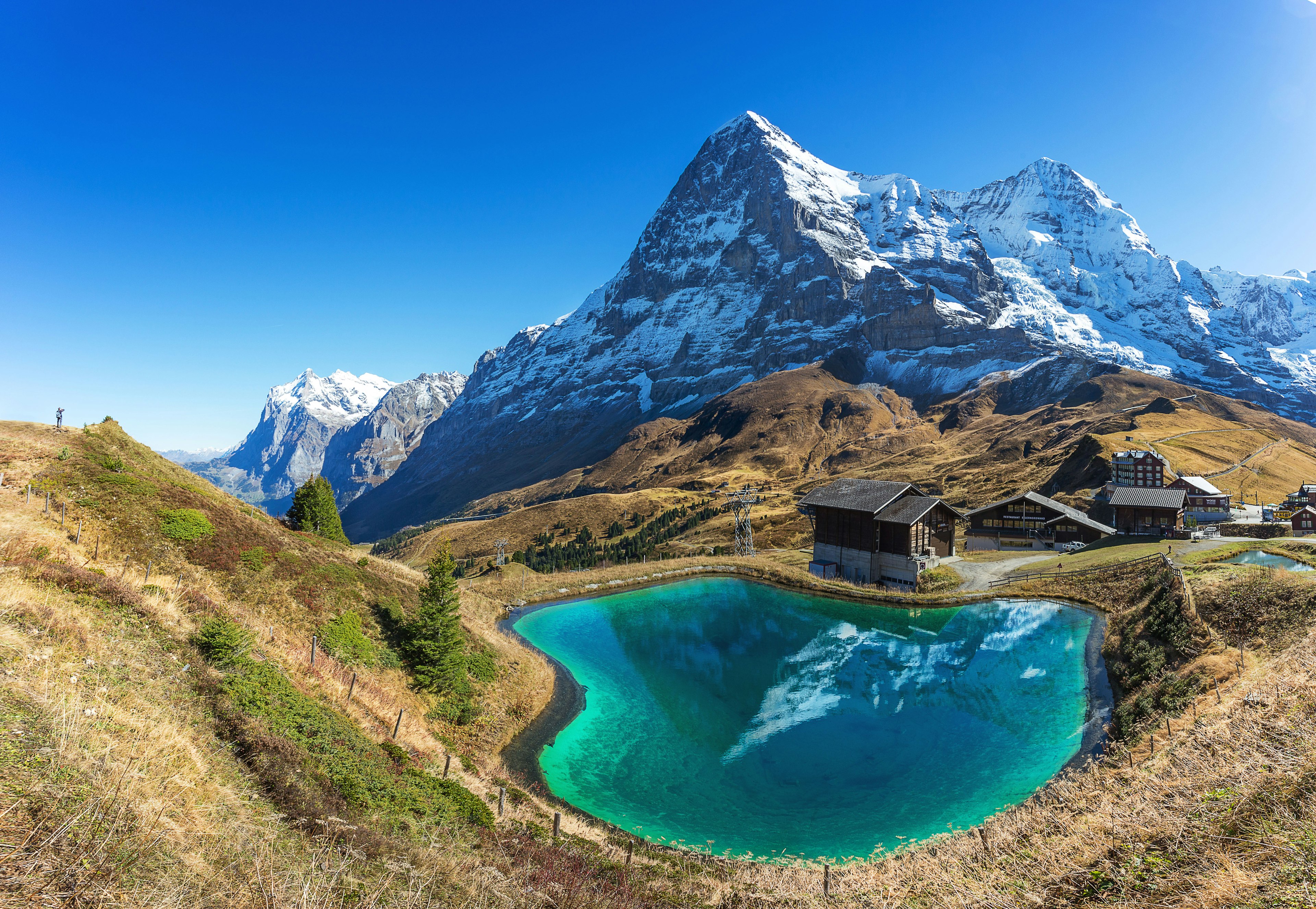 Jungfrau Peak reflected in the water of a hearth pond at Kleine Scheidegg