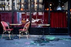 This photograph taken on April 7, 2023, in Paris, shows a terrace of the restaurant La Rotonde which windows' were broken the day before during a demonstration on the 11th day of action after the government pushed a pensions reform through parliament without a vote, using the article 49.3 of the constitution. - France on April 6, 2023 braced for another day of protests and strikes to denounce French President's pension reform one day after talks between the government and unions ended in deadlock. (Photo by JULIEN DE ROSA / AFP) (Photo by JULIEN DE ROSA/AFP via Getty Images)
1250851474
pension, demonstration, politics, Horizontal, topix, bestof