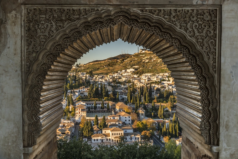 View of the Albayzin district of Granada, Spain, from a window in the Alhambra palace near sunset.
341928434
albaicin, albayzin, alhambra, ancient, andalusia, arabesque, arabic, archeology, architecture, art, artistic, artwork, castle, city, fortress, granada, lush, medieval, moor, moorish, mountain, muslim, ornate, palace, porthole, religion, sacred, spain, spanish, stone, view, wall, wealthy, window