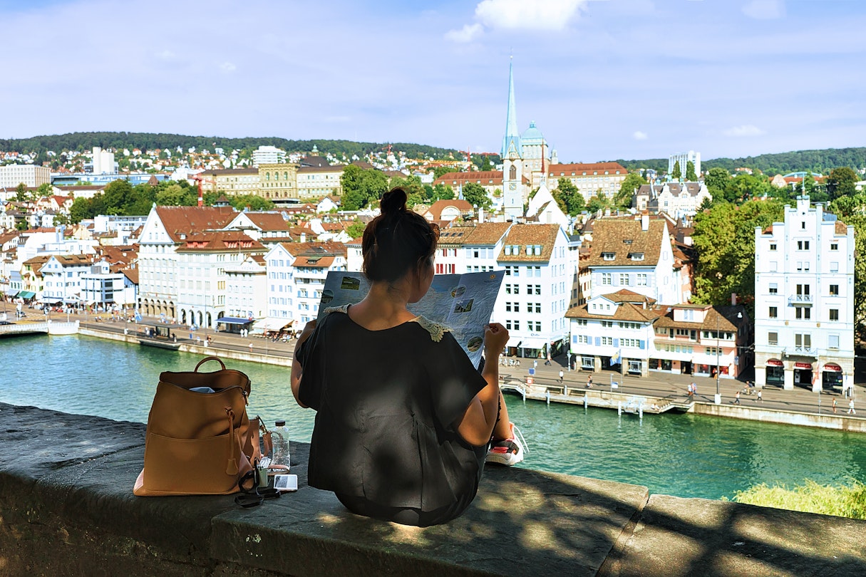 Zurich, Switzerland - September 2, 2016: Girl sitting on Lindenhof hill and looking into a city map in Zurich, Switzerland. Limmatquai and Predigerkirche on the background.
581991946
architecture, building, church, city, cityscape, downtown, embankment, europe, european, exterior, facade, girl, hill, historic, historical, landmark, limmat, limmatquai, lindenhof, look, map, no face, old, outdoor, person, predigerkirche, quay, read, river, riverfront, riverside, sit, spire, steeple, street, swiss, switzerland, tourism, tourist, touristic, tower, town, travel, traveler, urban, waterfront, woman, young, zurich