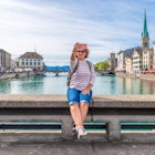 Woman taking picture of Zurich and Limmat river, Switzerland; Shutterstock ID 1164818767; your: Claire Naylor; gl: 65050; netsuite: Online editorial; full: Zurich for free
1164818767