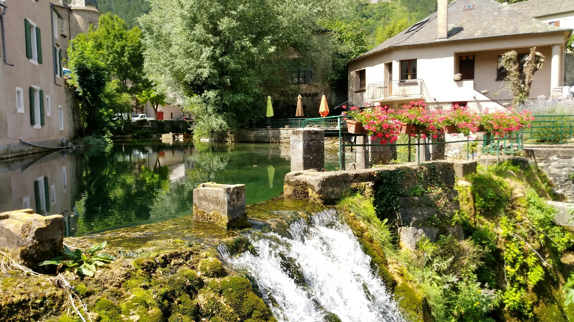The river running through the village centre in Florac, France