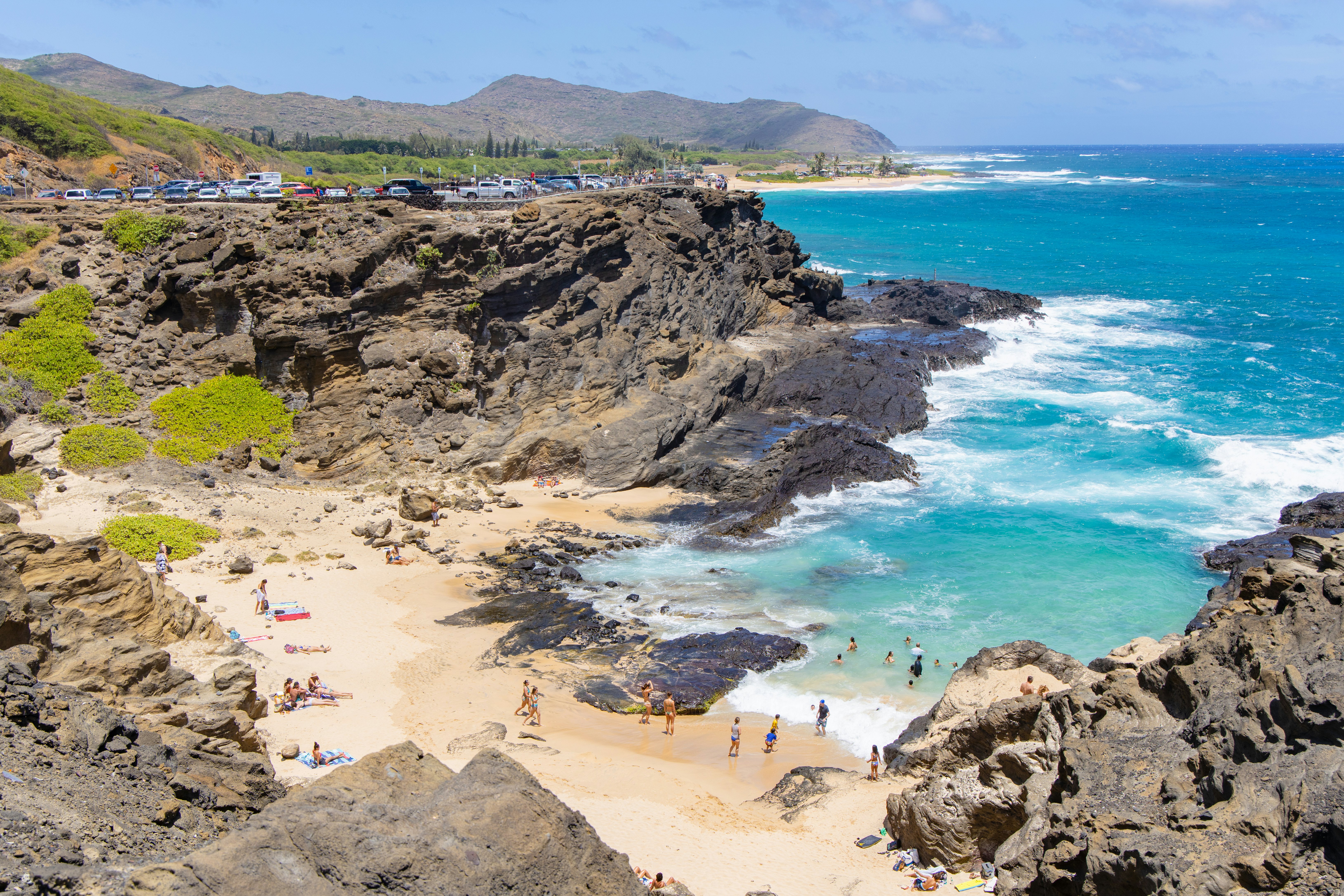 Halona Beach Cove, a small sandy beach surrounded by rocky cove at Oahu southeast.