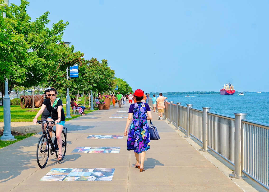 Detroit, Michigan, US- July 4, 2015: Detroit downtown riverside. People enjoying a sunny summer day on the America Independent holiday and celebration. Beautiful cityscape.; Shutterstock ID 1731684577; your: Jennifer Carey; gl: 65050; netsuite: Online Editorial; full: Best places to visit in Michigan
1731684577
Locals walking and cycling along the riverside in Detroit, Michigan.