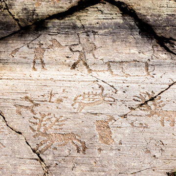 Rock Drawings in the Parco Nazionale delle Incisioni Rupestri di Naquane, Capo di Ponte, Italy.