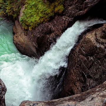 The lower waterfall of the Trümmelbach glacier waterfalls in the Lauterbrunnen Valley, Bernese Oberland, Switzerland.