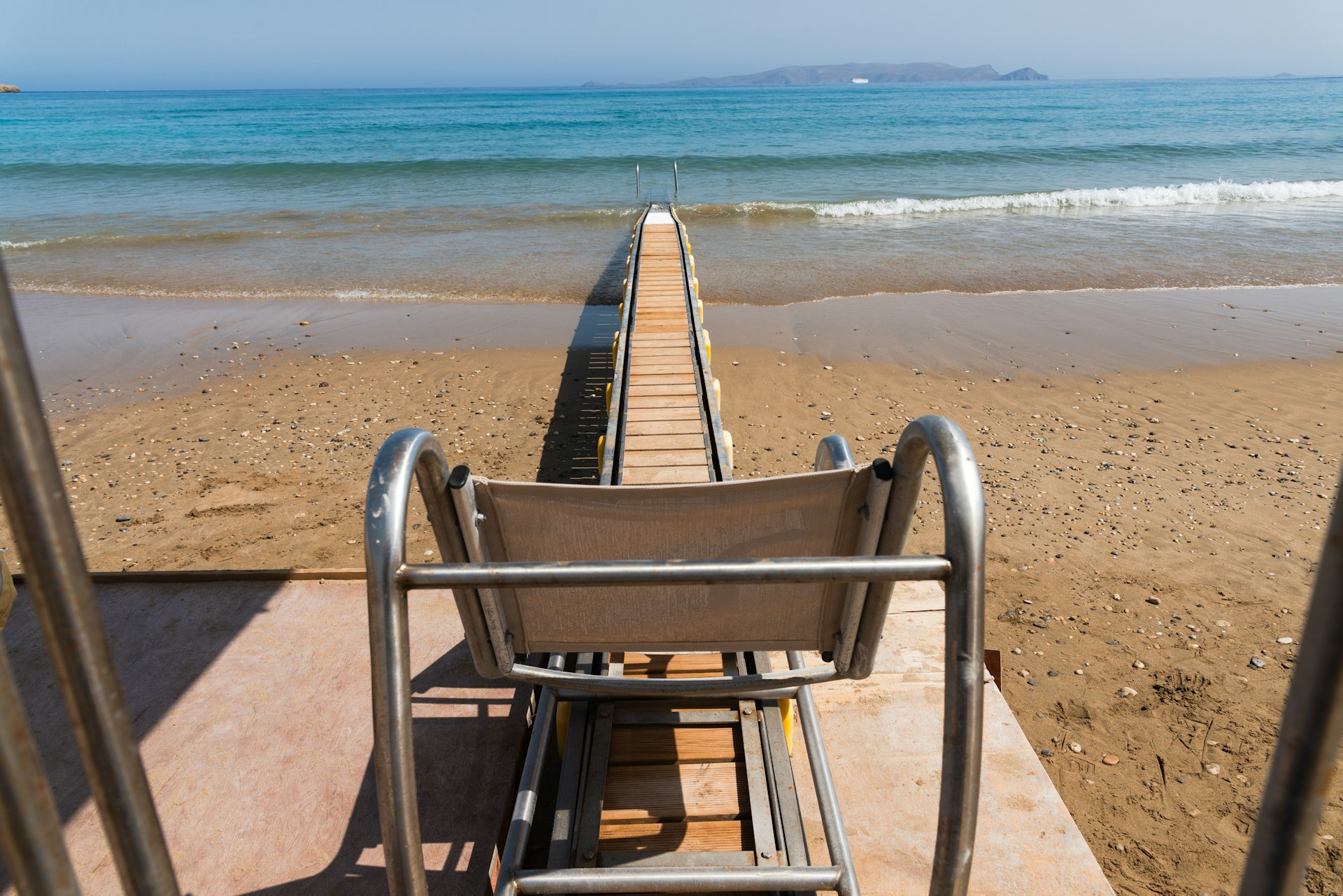 A ramp for wheelchairs leads to the water at a beach in Heraklion, Crete, Greece