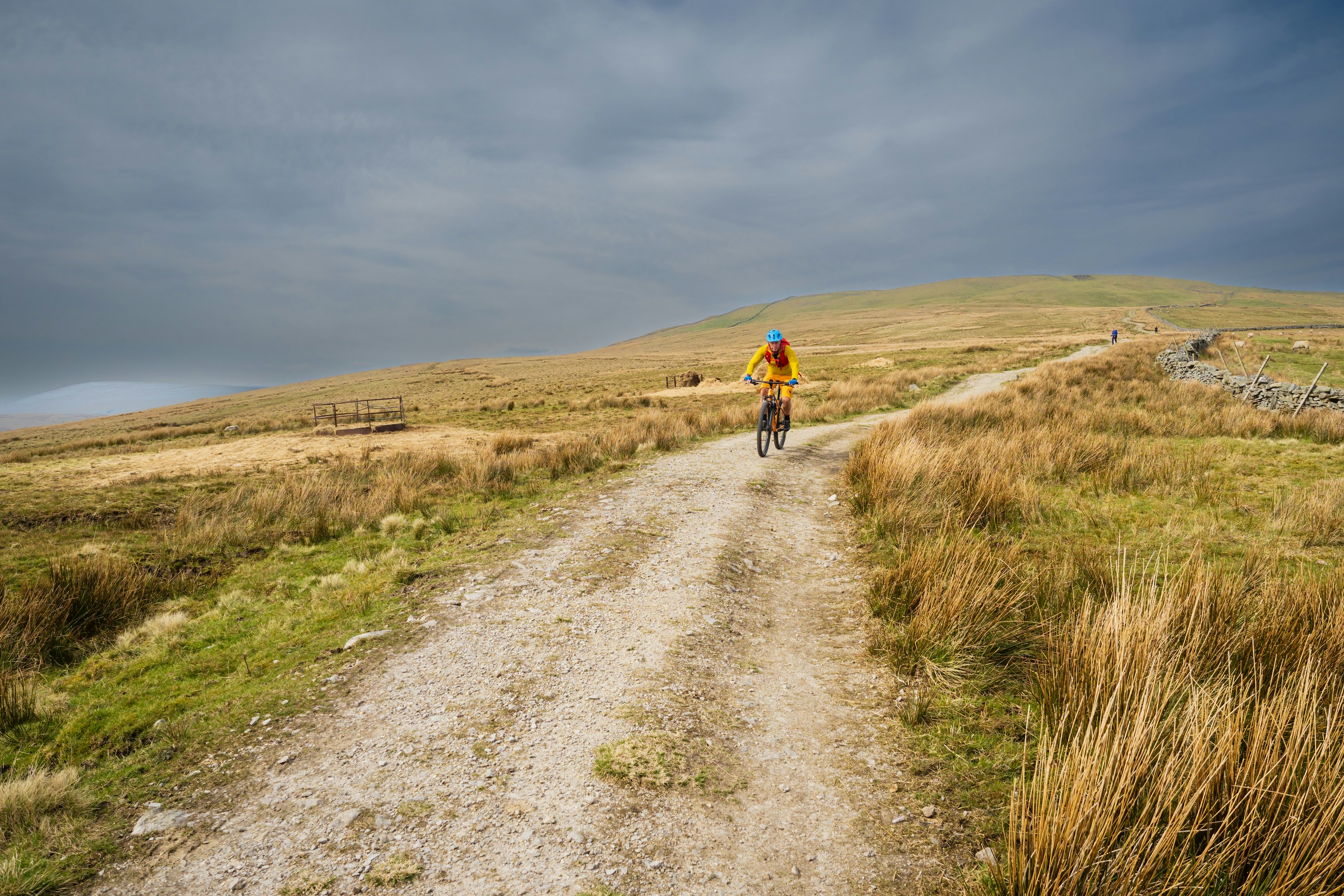 Cyclist on the Pennine Bridleway near to Great Knoutberry Hill, England