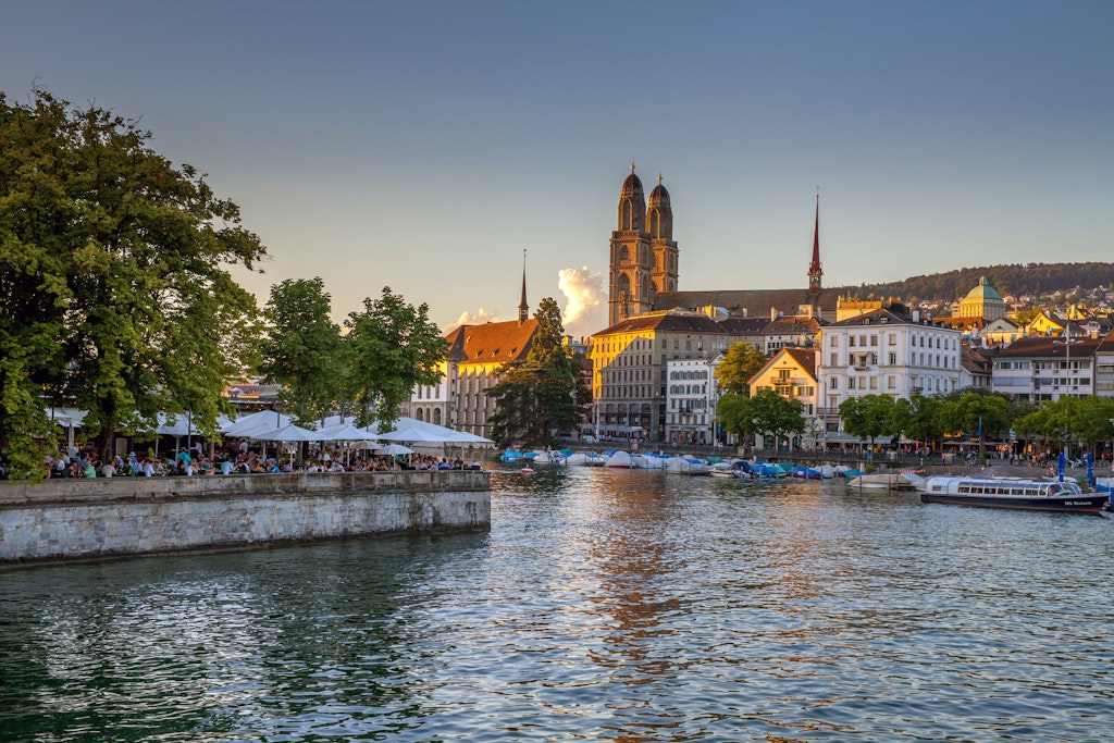 Iconic view of central Zurich on a warm summer evening. Main city sights including the FraumÃ¼nster Church.(Kirche FraumÃ¼nster) and GrossmÃ¼nster cathedral are seen on the banks of the Limmat River.
Iconic view of central Zurich on a warm summer evening. Main city sights including the Fraumünster Church.(Kirche Fraumünster) and Grossmünster cathedral are seen on the banks of the Limmat River.
1322179295