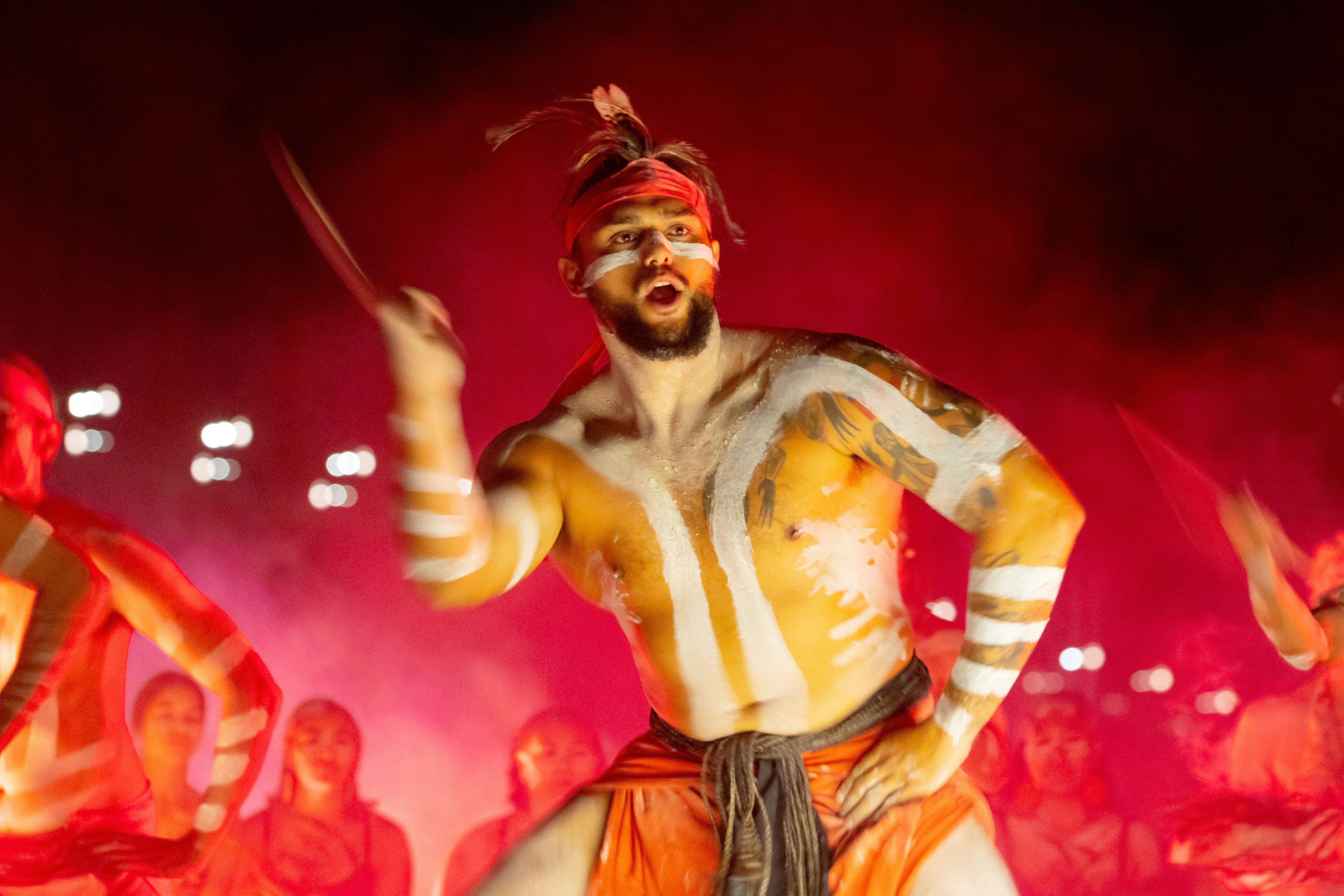 A shirtless performer at the opening ceremony for the 2022 Vivid Sydney festival in Sydney, New South Wales, Australia