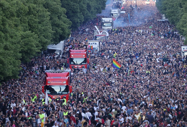 The Tiergarten is filled with trucks and participants for the Rave the Planet (Love Parade) party in 2022, Berlin, Germany