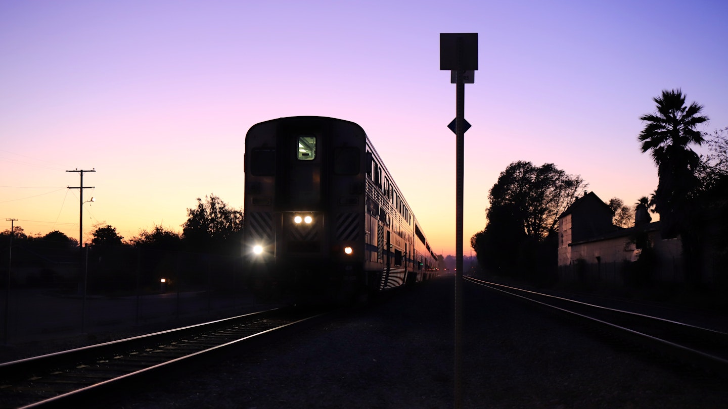 Amtrak Pacific Surfliner Train at Moorpark Station under the Sunset.
1460641662