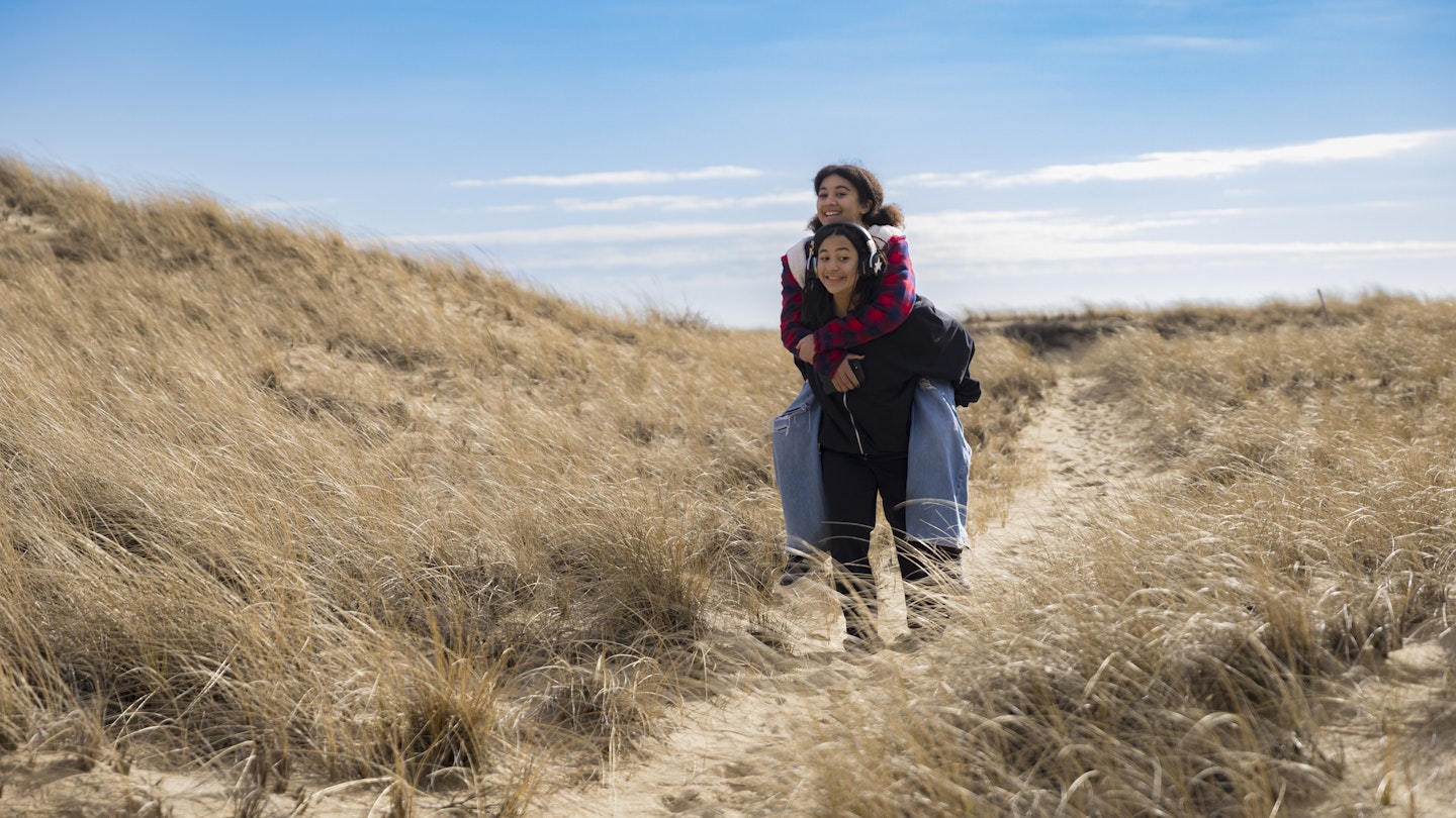 1485702014
african braids, african-american, best friends, bffs, biracial, black, black girls, braids, coat, friends, funny, happy, laugh, laughter, natural setting, nature walk, outdoor adventure, outside, piggy-back, piggy-back ride, play, province lands, racepoint, red and blue coat, relationship, sandy, sandy path, sibling relationship, siblings, sister love, sisterhood, sisterly, sisterly love, sisters, teens, yellow grass, young