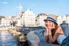A portrait of a young female tourist standing on the bridge in the old town of Zurich city. Having happy vacations in Switzerland
615486160
Shirt, Beautiful, Travel, People Traveling, Building Exterior, Girls, Women, Females, Weekend Activities, Downtown District, Limmat River, Swiss Culture, Young Adult, Zurich, Hat, Happiness, White, Old, Architecture, Vacations, Urban Scene, Cheerful, Tourist, Switzerland, Europe, Sunlight, Sky, River, Bridge - Man Made Structure, Tower, Cityscape, City, Town, Minster, Riverside, Sunny
