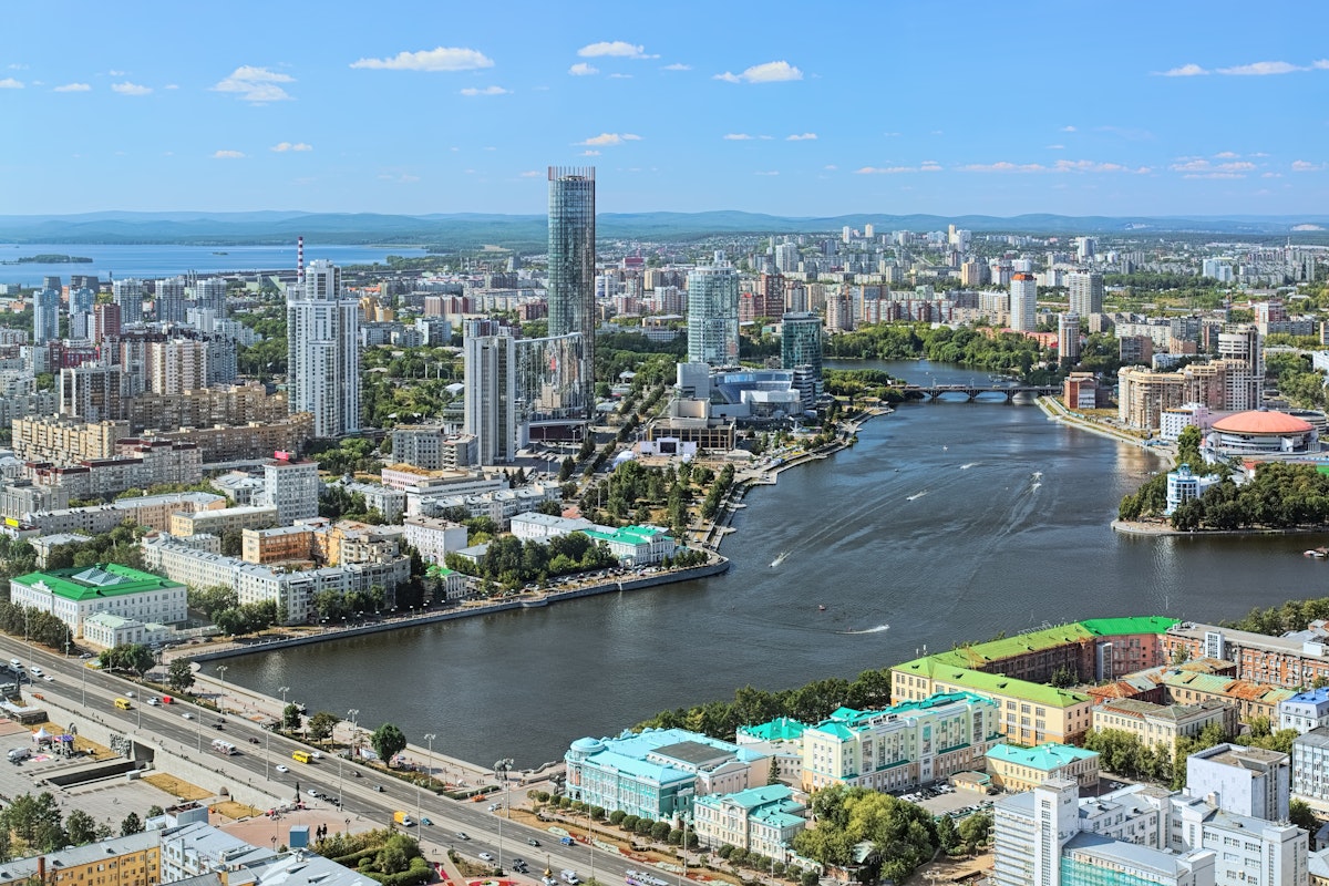 View of the historical center, city pond with dam, Yekaterinburg-City neighborhood and north-western side of the city from the observation deck on the 52nd floor of the Vysotsky skyscraper at 186 meters above the ground in Yekaterinburg.